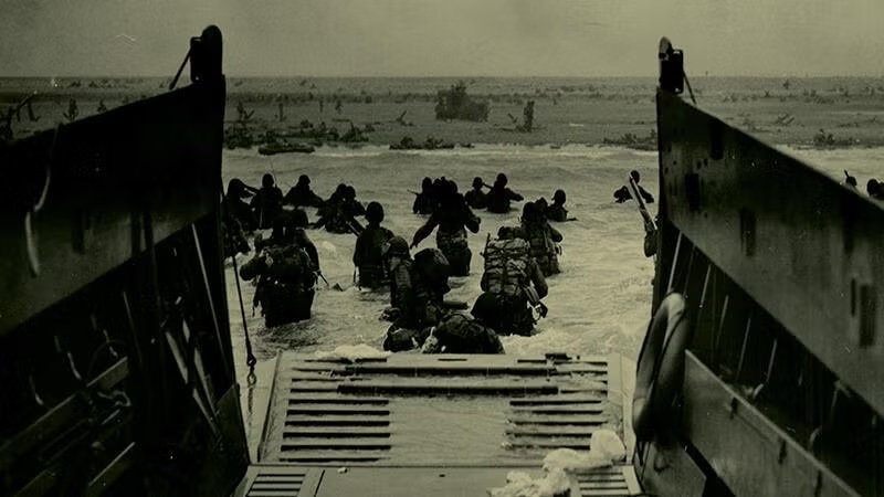 soldiers running through water to battlefield